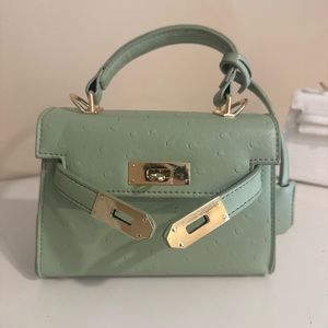 Small green handbag